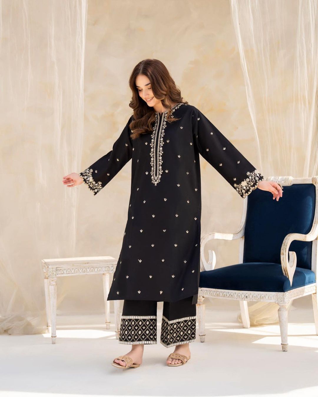 Style-NF 1306 Jut Black Embroidered 2 pc Unstitched Lawn Dress