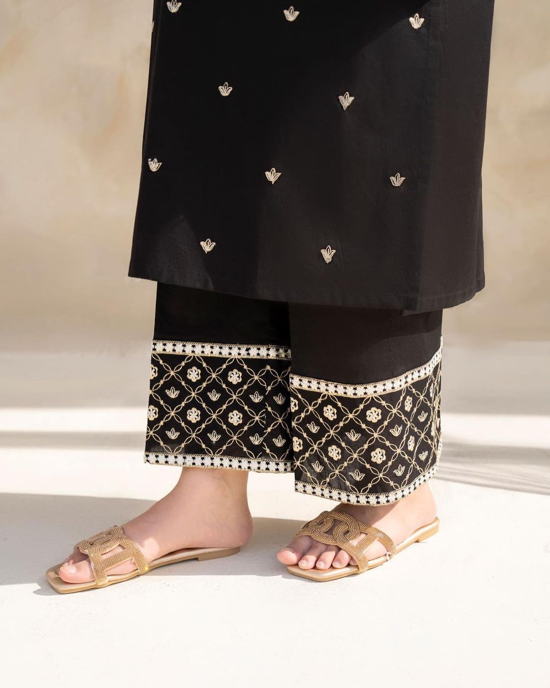 Style-NF 1306 Jut Black Embroidered 2 pc Unstitched Lawn Dress